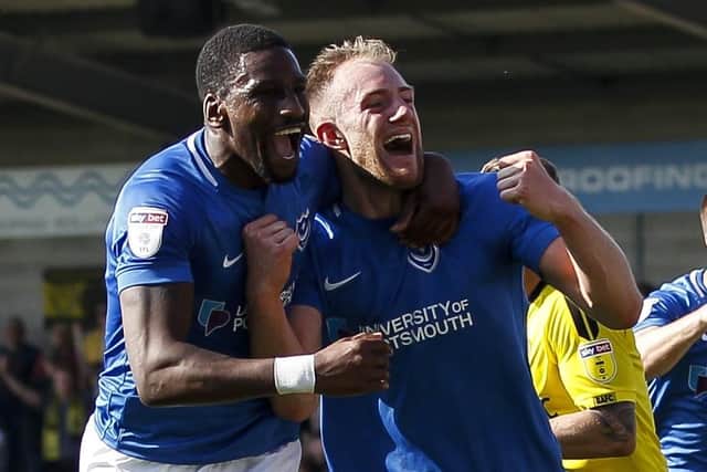 Matt Clarke, right, celebrates his Burton winner with Omar Bogle. Picture: Daniel Chesterton