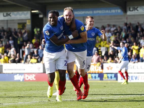 Matthew Clarke of Portsmouth celebrates with Omar Bogle of Portsmouth after the late winner yesterday. (Photo by Daniel Chesterton/phcimages.com)