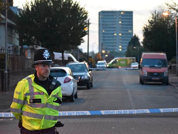 Police at the scene in Wolverhampton where a six-year-old boy was injured when a group of men opened fire on a house with a shotgun. Picture: Matthew Cooper/PA Wire