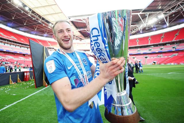 Matt Clarke celebrates Pompey's Checkatrade Trophy success. Picture: Joe Pepler