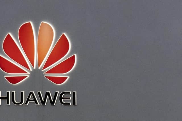 Prime Minister Theresa May has given the go-ahead for Huawei to help build Britain's new 5G network. Picture: Steve Parsons/PA Wire