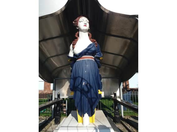 The wooden figurehead from Royal Navy ship HMS Arethusa. Photo: Historic England/PA Wire