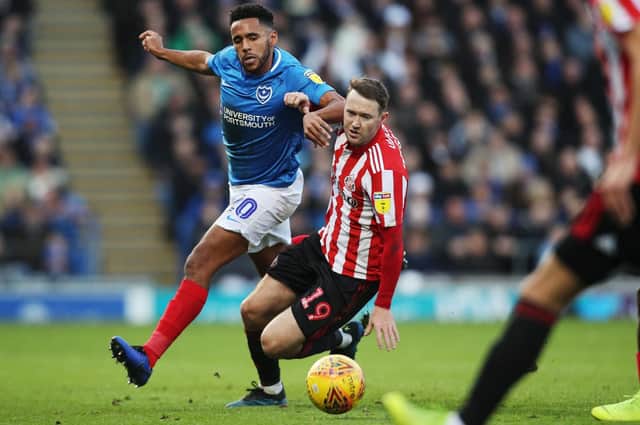 Nathan Thompson battles Aiden McGeady for the ball during Pompey's victory over Sunderland at Fratton Park. Picture: Joe Pepler