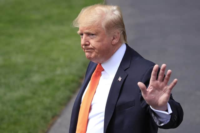 President Donald Trump waves after talking to reporters as he leaves the White House in Washington, Wednesday, April 24, 2019, for a trip to Atlanta with first lady Melania Trump to participate an opioids summit. Picture: AP Photo/Manuel Balce Ceneta