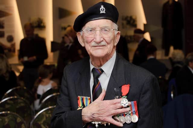 Veteran John Jenkins when he collected France's highest military honour, the Legion d'Honneur for his heroism during the D-Day landings in Normandy. Picture: Allan Hutchings