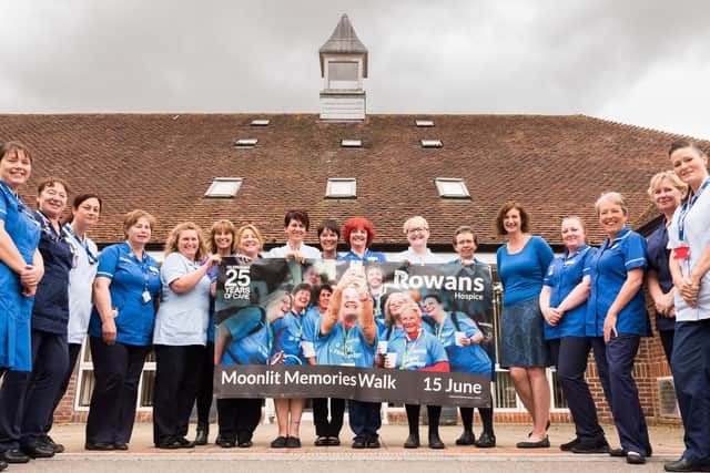 Nurses and Healthcare Support Workers with their banner outside of the hospice.  Picture: Vernon Nash (260419-004)
