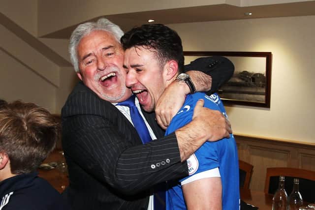Enda Stevens celebrates League Two promotion with former Pompey chairman Iain McInnes in 2017. Picture by Joe Pepler