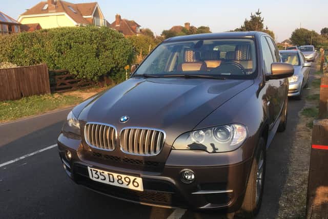 Car with Chinese diplomatic plates at Hill Head Beach, Fareham.
