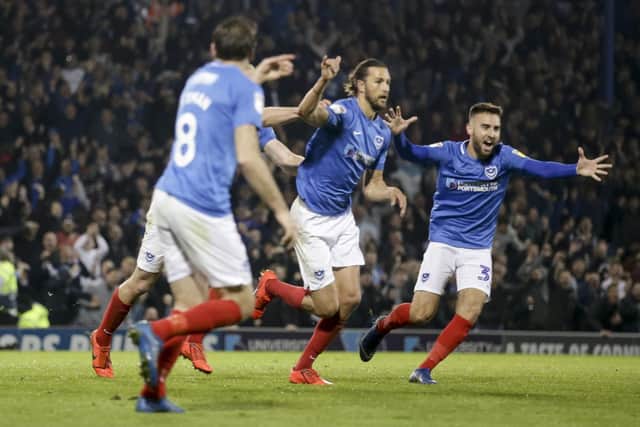 Christian Burgess celebrates scoring in Pompey's 3-2 defeat against Peterborough. Picture: Robin Jones