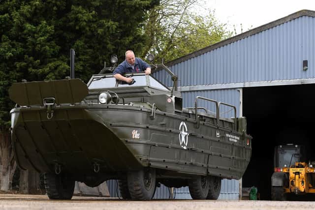 Graham Smitheringale works to restore a DUKW amphibious Second World War vehicle at a farm in Glinton, Peterborough, which he hopes will take part in the D Day 75 commemorations in Portsmouth Picture: Joe Giddens/PA Wire