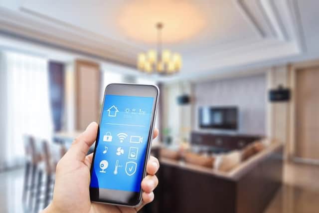 Many smart devices are connected through your phone, allowing you to have full access of your technology even when you're out and about (Photo: Shutterstock)