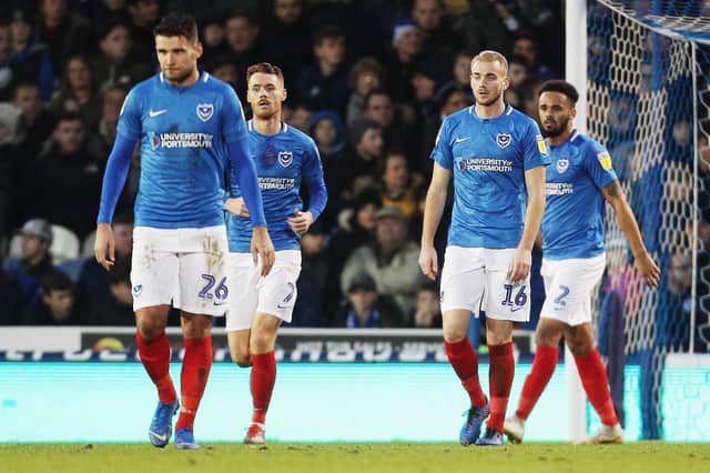 Pompey dejected after conceding in their 2-0 loss to Blackpool at Fratton Park. Picture: Joe Pepler