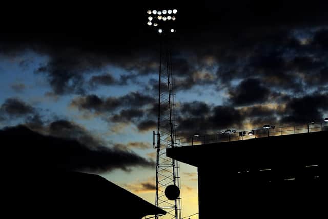 Fratton Park and its floodlights are the subject of summer development plans which are expected to hinder staging the opening game of 2019-20. Picture: Bryn Lennon/Getty Images