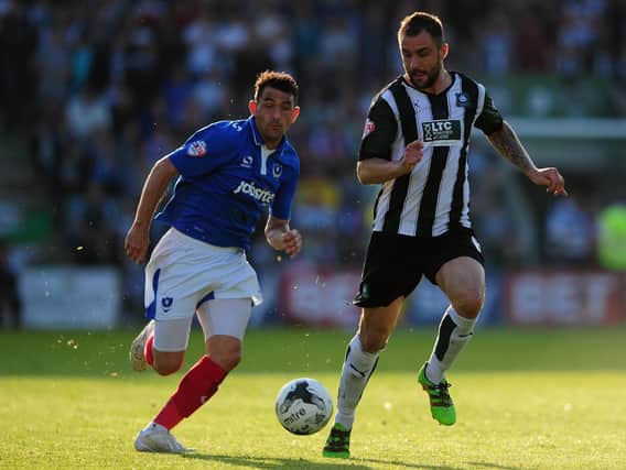 Plymouth's Peter Hartley, right, tracks Pompey's Gary Roberts during the 2016 League Two play-off second-leg game at Home Park. Picture: Harry Trump/Getty Images