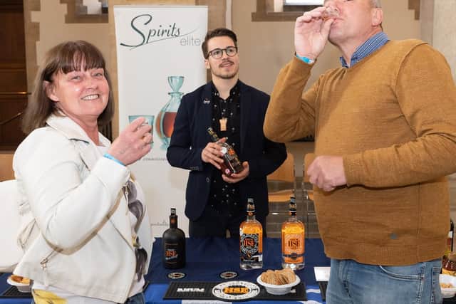 Pictured is: Debbie and Peter Callow with Paul from Spirits Elite.Picture: Keith Woodland (110519-3)