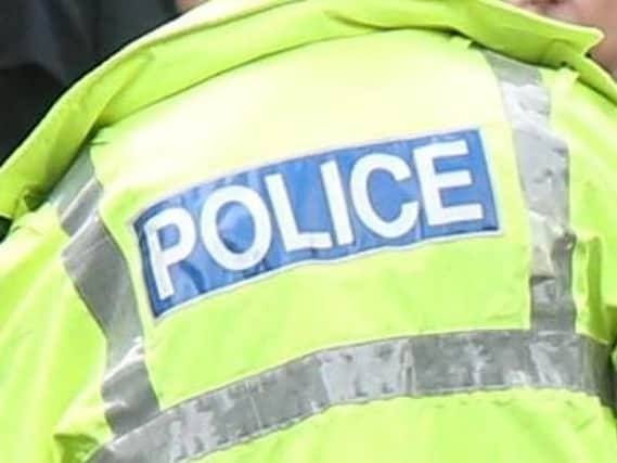 Police officers are hunting for the robber following an attack in Waterlooville on Friday.