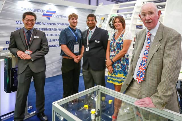 Barnbook Systems Ltd's exhibition team. From left, graduate engineer Lee Wei Jack, apprentice Shane Hutton, quality manager Vic Gunesekaran, head of administration Jane Hughes and managing director Tony Barnett.