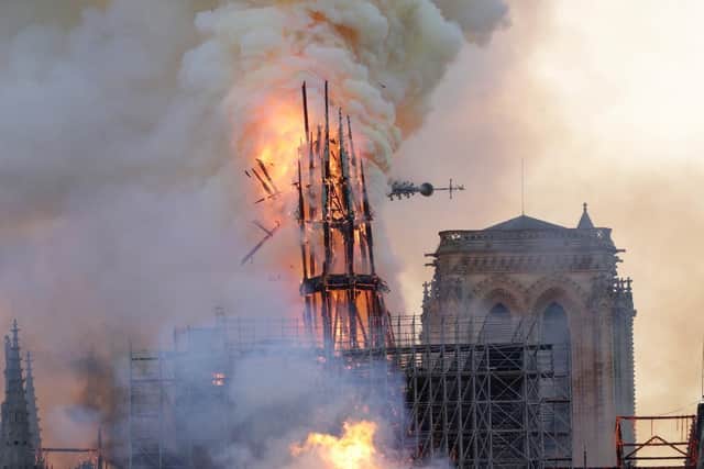 The steeple and spire collapses as smoke and flames engulf the Notre-Dame Cathedral in Paris on April 15, 2019.
GEOFFROY VAN DER HASSELT/AFP/Getty Images)