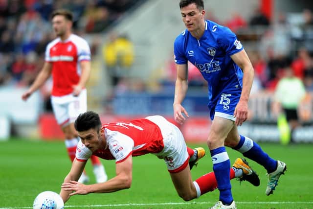 George Edmundson, right, in action for Oldham against Rotherham  Picture Jonathan Gawthorpe