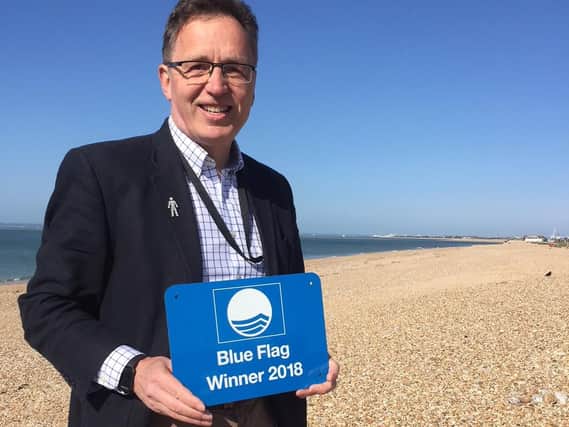 Councillor Gary Hughes at Beachlands with Hayling Island's Blue Flag award last year. Picture from Havant Borough Council