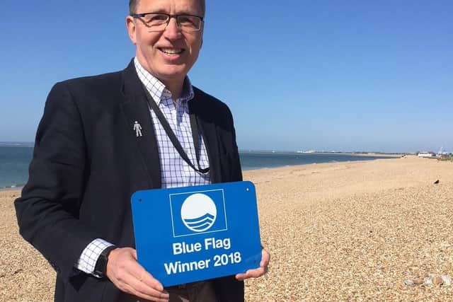 Councillor Gary Hughes at Beachlands with Hayling Island's Blue Flag award last year. Picture from Havant Borough Council