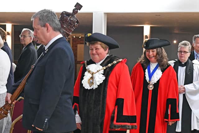 The procession enters the hall led by The Mace Bearer, Retiring Mayor Cllr. Diane Furlong and the newly elected Mayor Cllr. Kathleen Jones. Picture: Malcolm Wells (190515-9242)