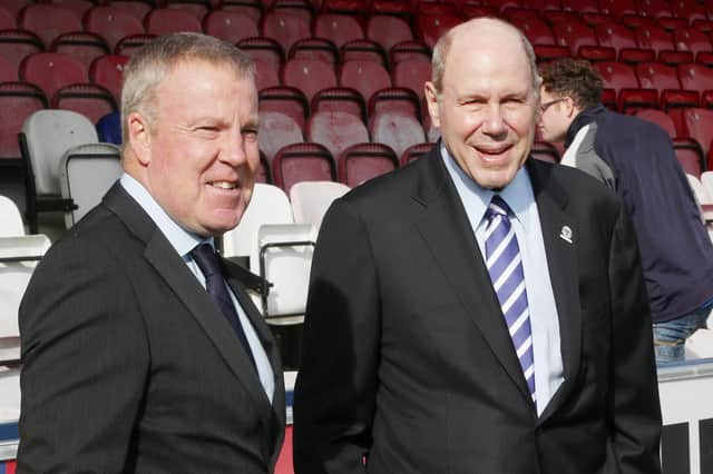 Pompey boss Kenny Jackett, left, alongside chairman Michael Eisner. Picture: Joe Pepler