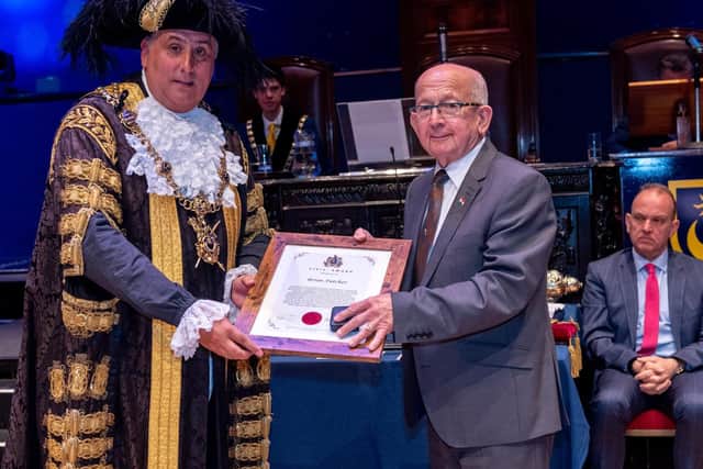 Newly-elected Lord Mayor Cllr David Fuller presents a Civic Award to Brian Futcher. Picture: Vernon Nash (Vernon Nash_Mayor Making Ceremony 2019-584)