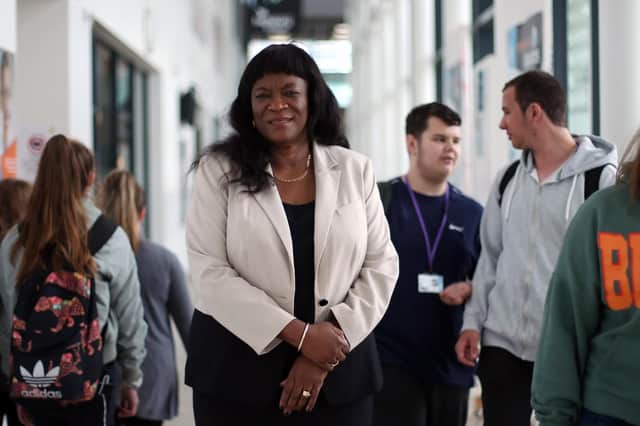 Stella Mbubaegbu, principal of Highbury College, pictured at the college with students. Picture: Chris Moorhouse