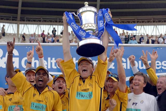 Hampshire's captain Shaun Udal lifts the trophy after defeating Warwickshire in the C&G Trophy Final match at Lord's in 2005