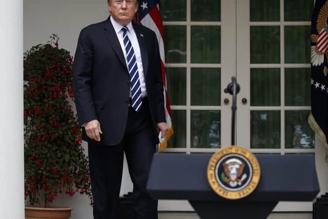 President Donald Trump arrives to deliver a statement in the Rose Garden of the White House, Wednesday, May 22, 2019, in Washington. (AP Photo/Evan Vucci)