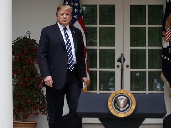 President Donald Trump arrives to deliver a statement in the Rose Garden of the White House, Wednesday, May 22, 2019, in Washington. (AP Photo/Evan Vucci)