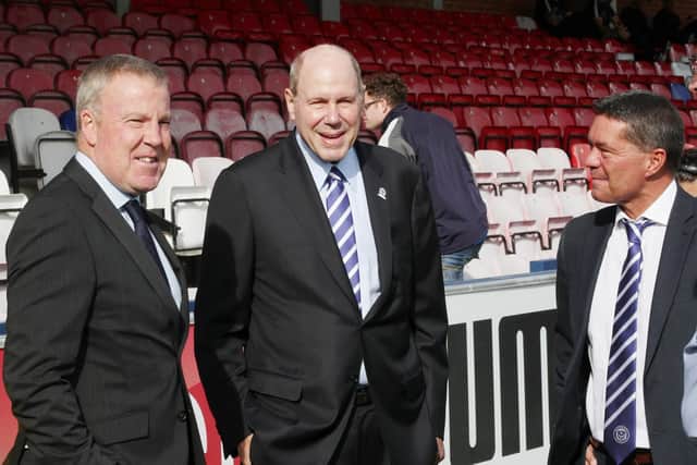 Kenny Jackett, left, with Michael Eisner, centre, and Mark Catlin, right. Photo by Joe Pepler.
