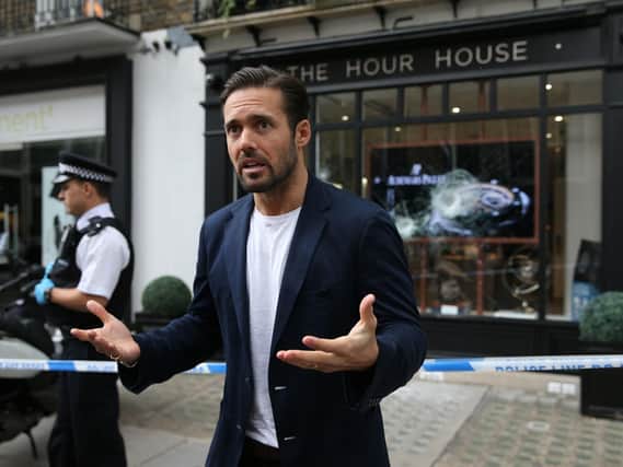 Spencer Matthews outside The Hour House on Duke Street, Westminster, where moped-riding armed robbers targeted the luxury watch shop, making off with items stolen from the smashed shop window. Picture: Isabel Infantes/PA Wire