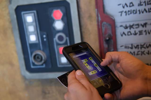Galaxy's Edge is the first section of a Disney Park designed to integrate with a mobile app.