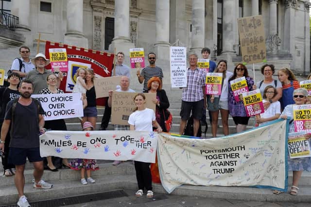 Protesters against US president Donald Trump unite on the steps of Portsmouth Guildhall in July last year Picture: Malcolm Wells