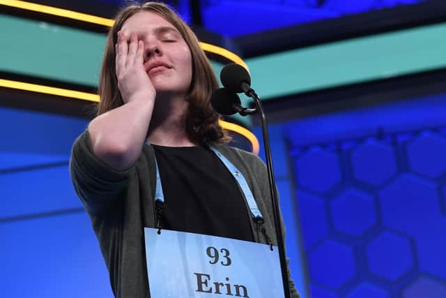 Erin Howard, 14, of Huntsville, Ala., reacts as she prepares to spell her final word as she competes in the finals of the 2019 Scripps National Spelling Bee in Oxon Hill, Md., Thursday, May 30, 2019. She spelled the word correctly and she and seven other spellers will share the 2019 championship. (AP Photo/Susan Walsh)