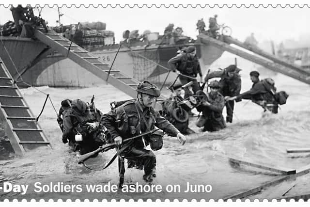 Royal Mail handout photo of a stamp featuring soldiers wading ashore on Juno beach during the D-Day landings, one of the new stamps that will be issued to commemorate D-Day. Picture: Royal Mail/PA Wire