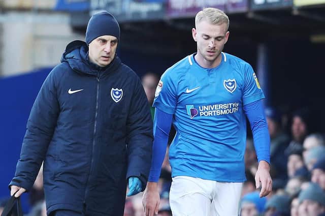 Jack Whatmough, right, and Pompey head physio Bobby Bacic. Picture: Joe Pepler