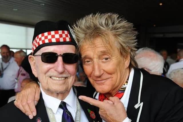 Handout file photo dated 02/06/19 issued by Hello! of Rod Stewart with D-Day veteran Leonard Williams 93, who served in Argyll and Sutherland Highlanders, aboard the MV Boudicca ahead of its departure from the port of Dover in Kent. Picture: Hello!/PA Wire
