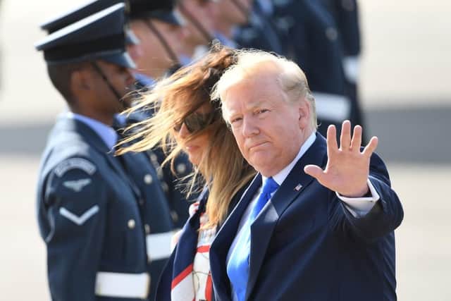 US President Donald Trump and his wife Melania arrive at Stansted Airport in Essex, aboard Air Force One for the start of his three day state visit to the UK. Picture: Joe Giddens/PA Wire