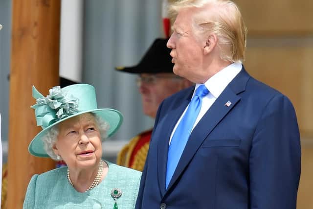 Queen Elizabeth II and US President Donald Trump during a Ceremonial Welcome at Buckingham Palace, London, on day one of his three day state visit to the UK.