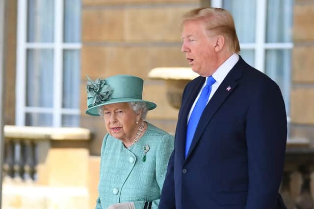 Queen Elizabeth II and Donald Trump during the Ceremonial Welcome at Buckingham Palace, London, on day one of US President Donald Trump's three day state visit to the UK.