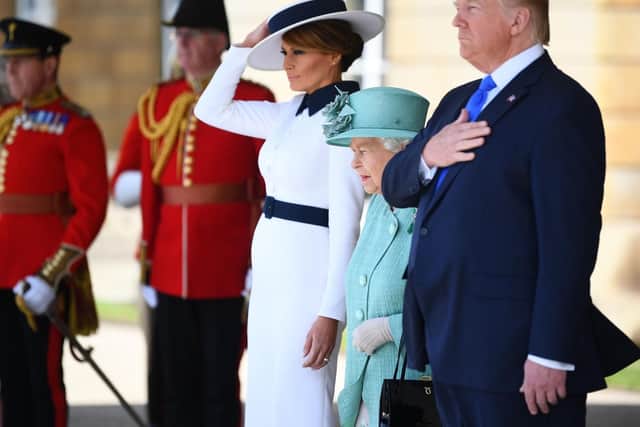Melania Trump, Queen Elizabeth II and Donald Trump during the Ceremonial Welcome at Buckingham Palace,