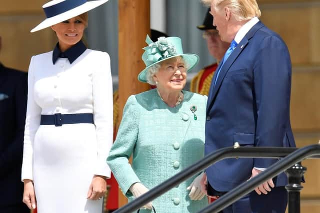 First Lady Melania Trump, Queen Elizabeth II and US President Donald Trump