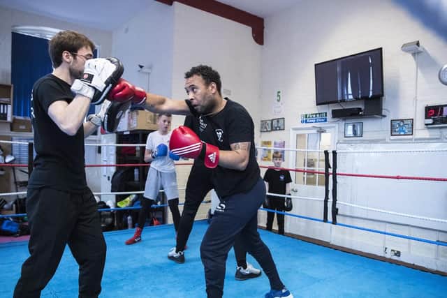 Gareth Tennant (right) with a fellow member of the Heart of Portsmouth Boxing Academy.