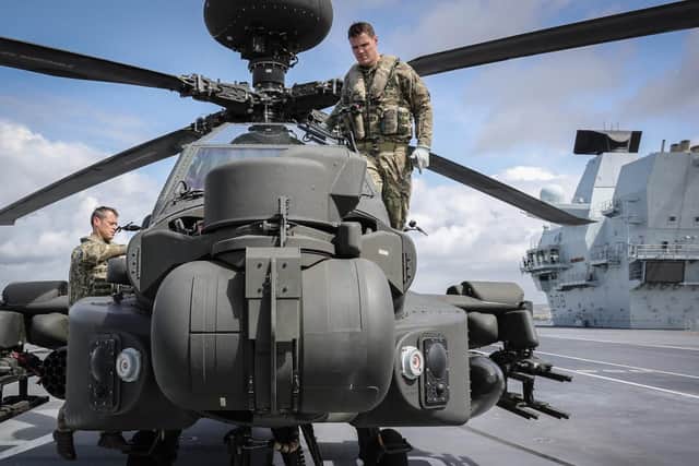 A Boeing AH-64 Apache from the British Army Air Corps has landed onboard HMS Queen Elizabeth for the first time. Picture: MoD
