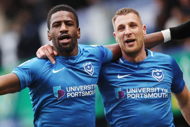 Omar Bogle, left, celebrates scoring against Scunthorpe with Lee Brown. Picture: Joe Pepler
