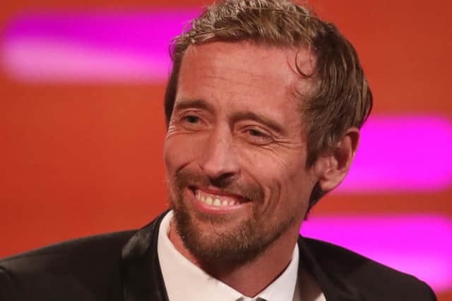 Former Pompey striker Peter Crouch  joked about naming his newborn son after a Champions League winner and a curry house. Picture: Isabel Infantes/PA Wire