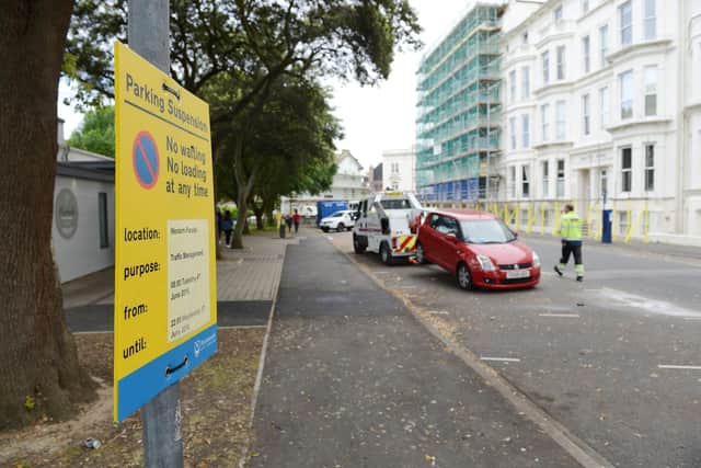 Vehicles that have not been removed from the restricted parking areas around Southsea Common in time are towed away by vehicle recovery specialists.  Photographs taken on Western Parade, Southsea. Picture: Morten Watkins/Solent News & Photo Agency